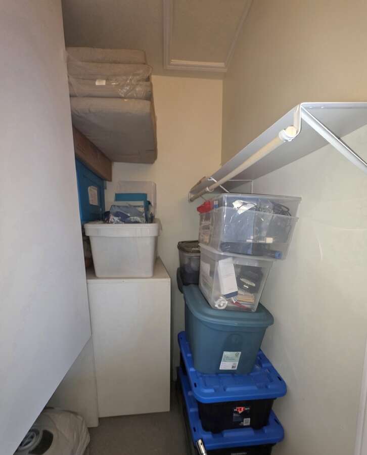 Walk-in closet storage area off of 4th bedroom/family room.