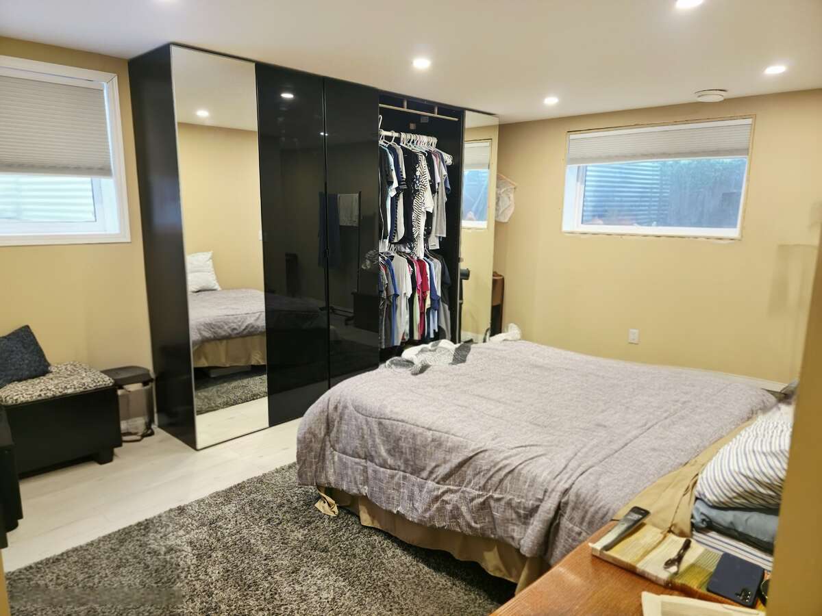 LOWER LEVEL - BEDROOM WITH LARGE WINDOWS