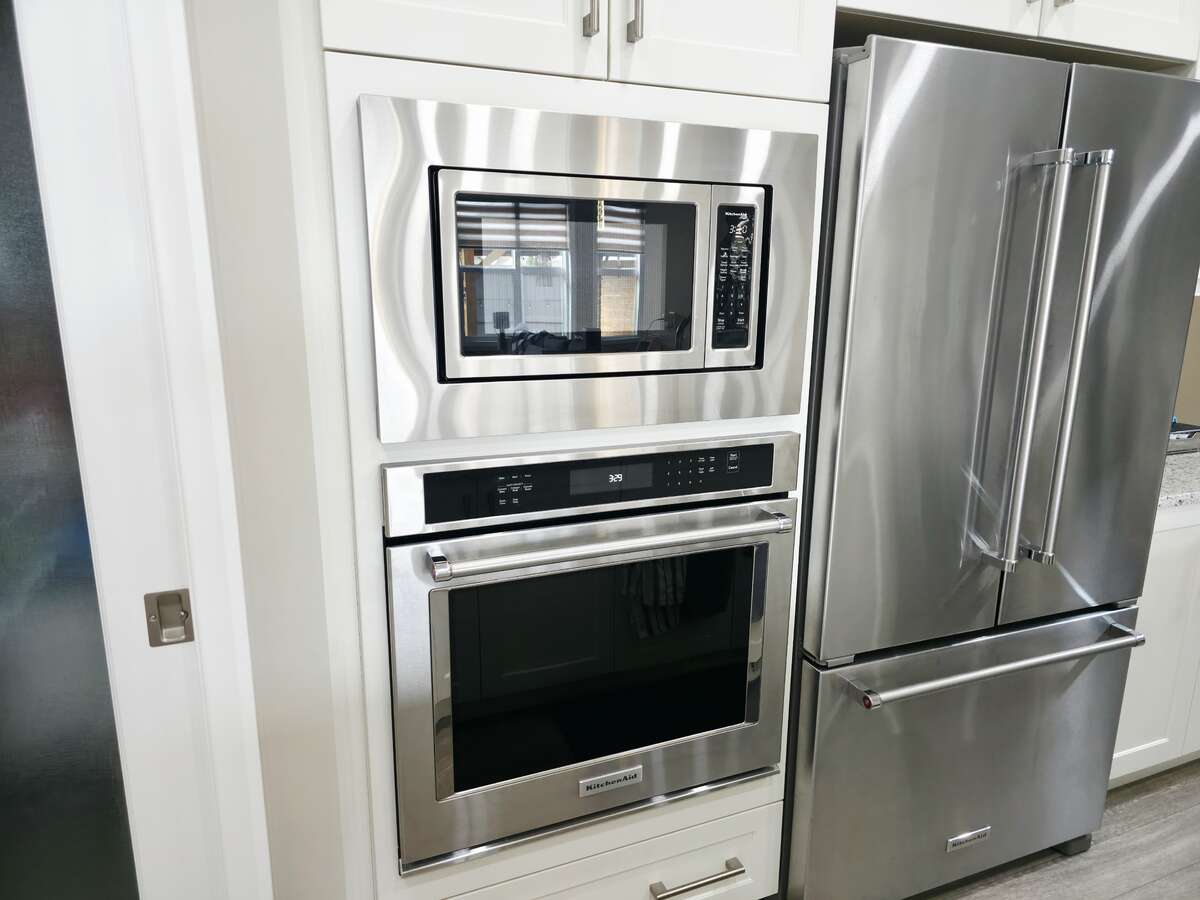 MAIN LEVEL - WALL OVEN AND INSIDE WATER/ICE DISPENSER FRIDGE