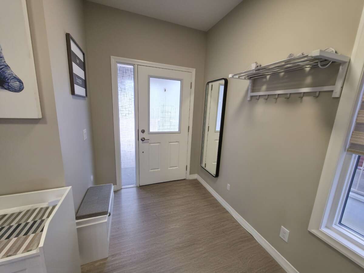 MAIN LEVEL - LARGE ENTRANCE WITH EXTRA WINDOW