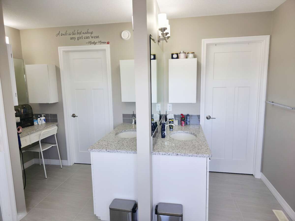 UPPER LEVEL - PRIMARY BATHROOM - HIS AND HER SIDE