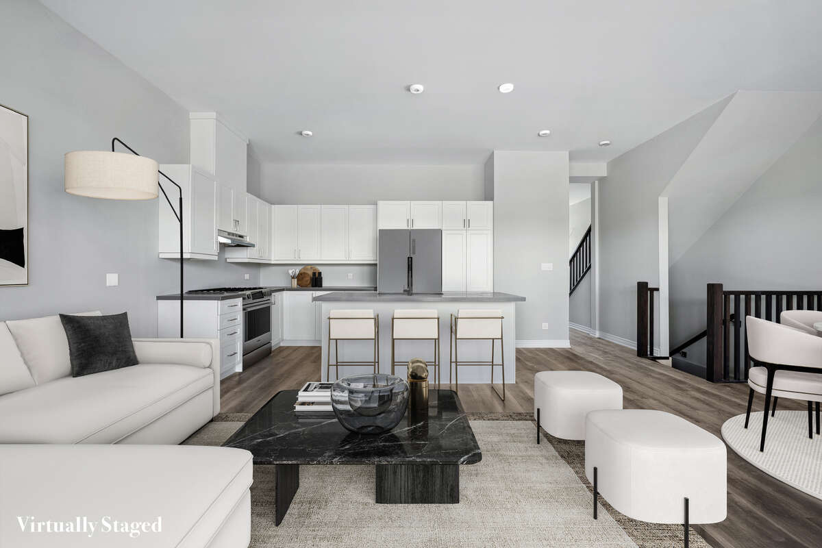 Virtually staged living and kitchen rendering based on floor plan.