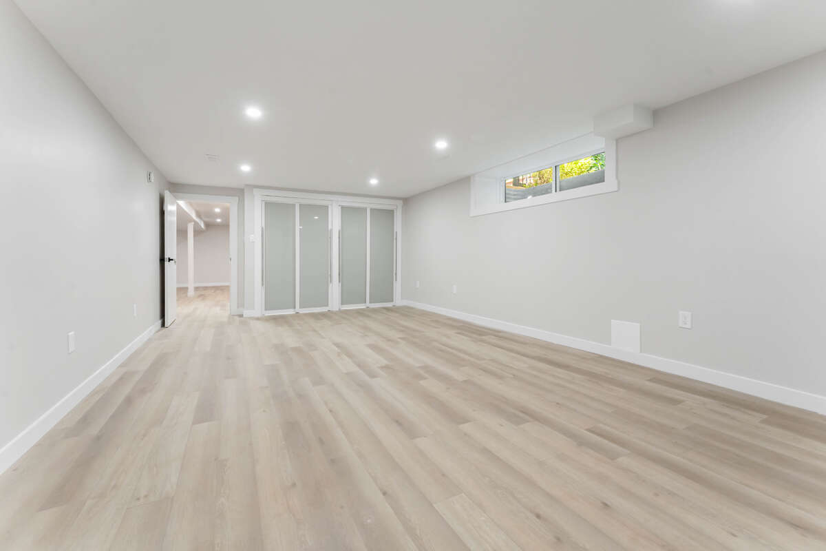 huge lower level bedroom with 3 closets