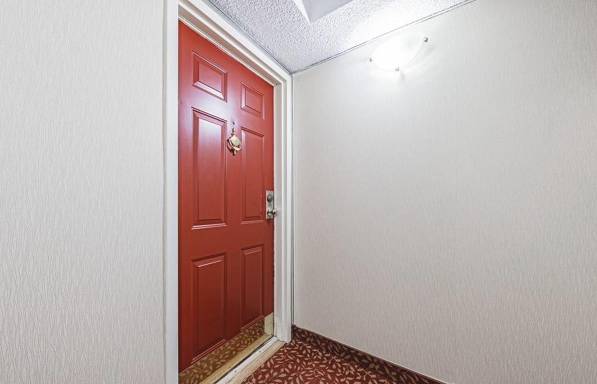 Front door to unit on second floor