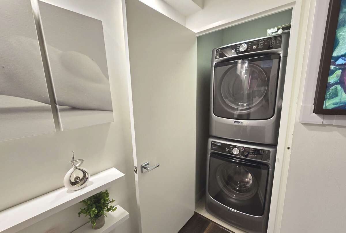 In-unit laundry with commercial size high-efficiency washer and dryer.