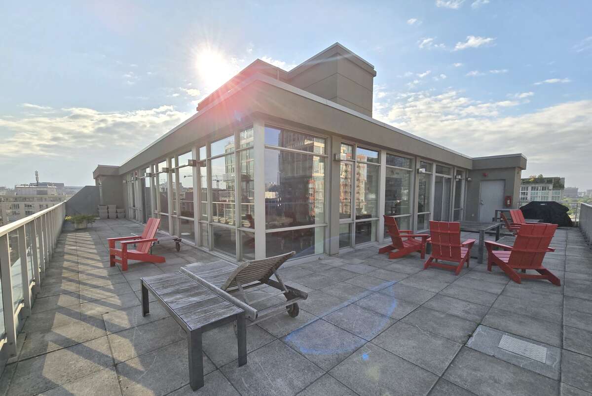 Savor sunny afternoons on the expansive rooftop deck, complete with comfortable seating and BBQ facilities.