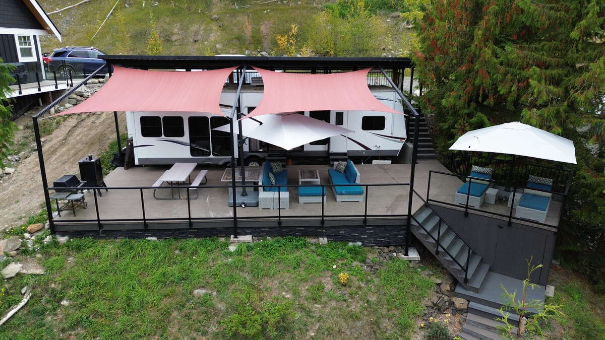 Turnkey lakefront setup with covered RV and deck