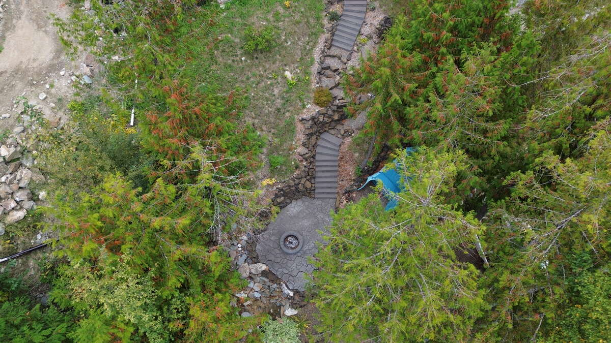Landscaped pathway from deck to lakefront