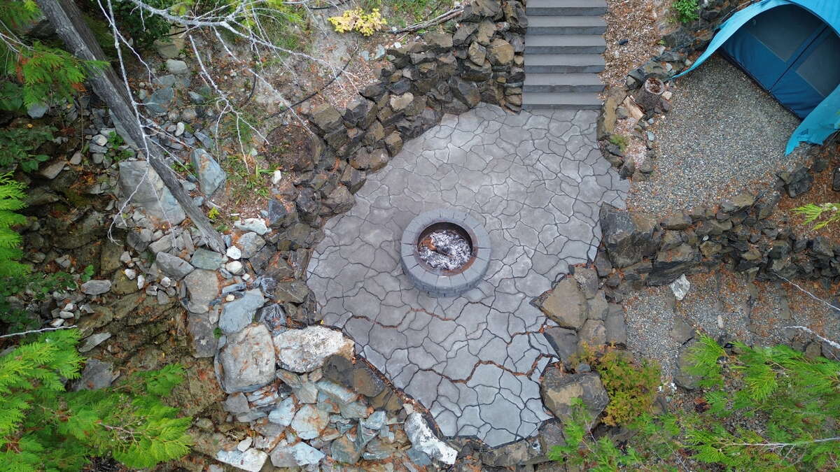 Lower patio and firepit area