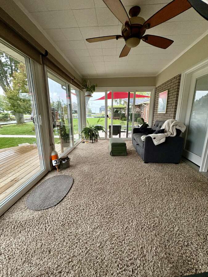 Cozy sunroom with fireplace