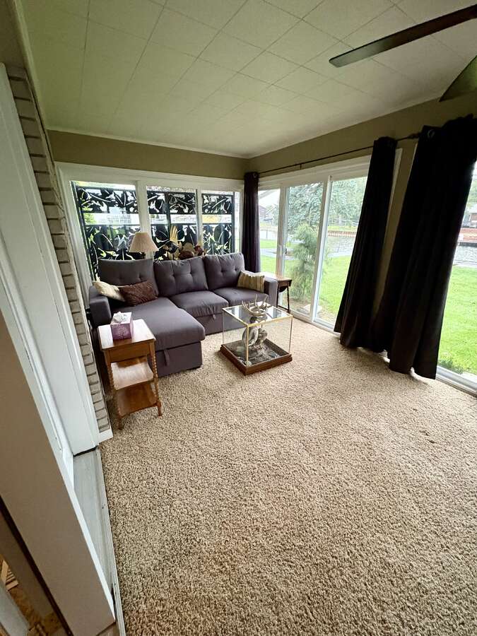 Cozy sunroom with fireplace