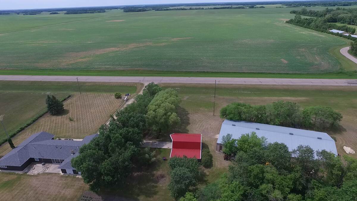 Land with Building(s) / Acreage / Golf Course View / Home-Based Business Potential / House For Sale in Gladstone, MB - 4 bed, 2.5 bath