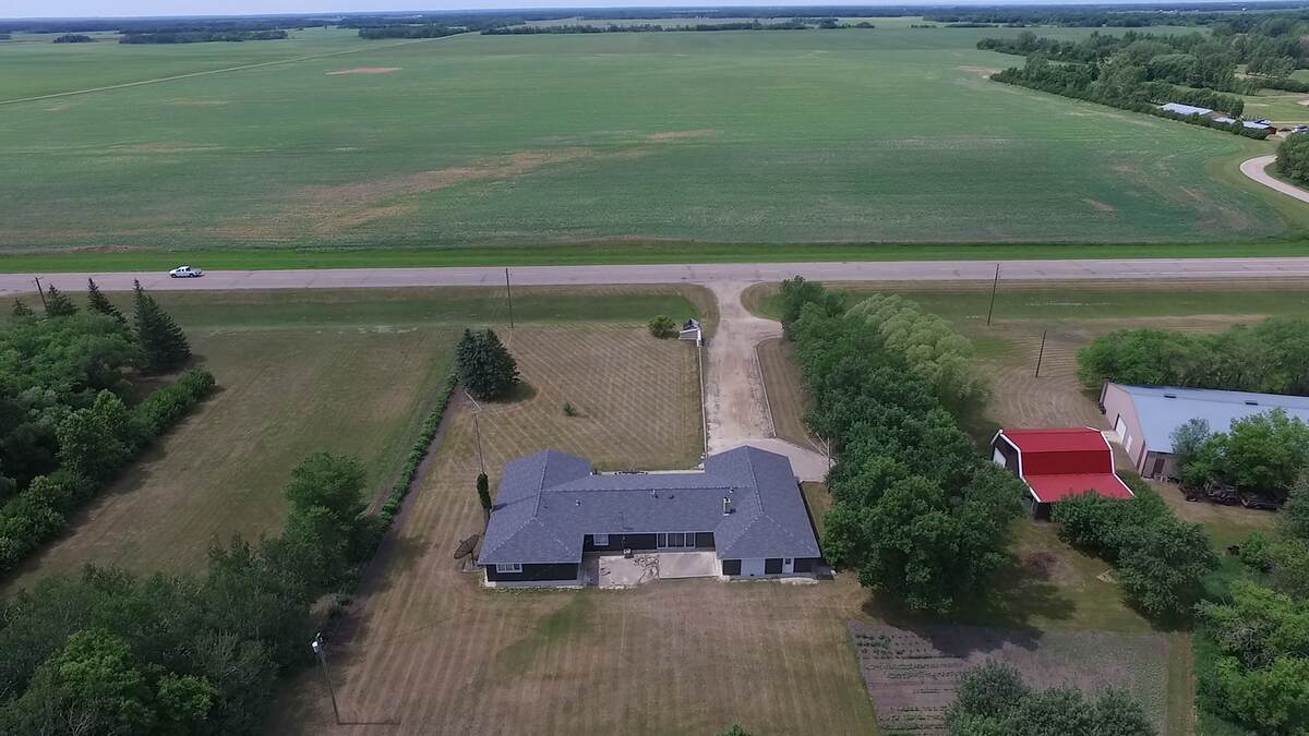 Land with Building(s) / Acreage / Golf Course View / Home-Based Business Potential / House For Sale in Gladstone, MB - 4 bed, 2.5 bath