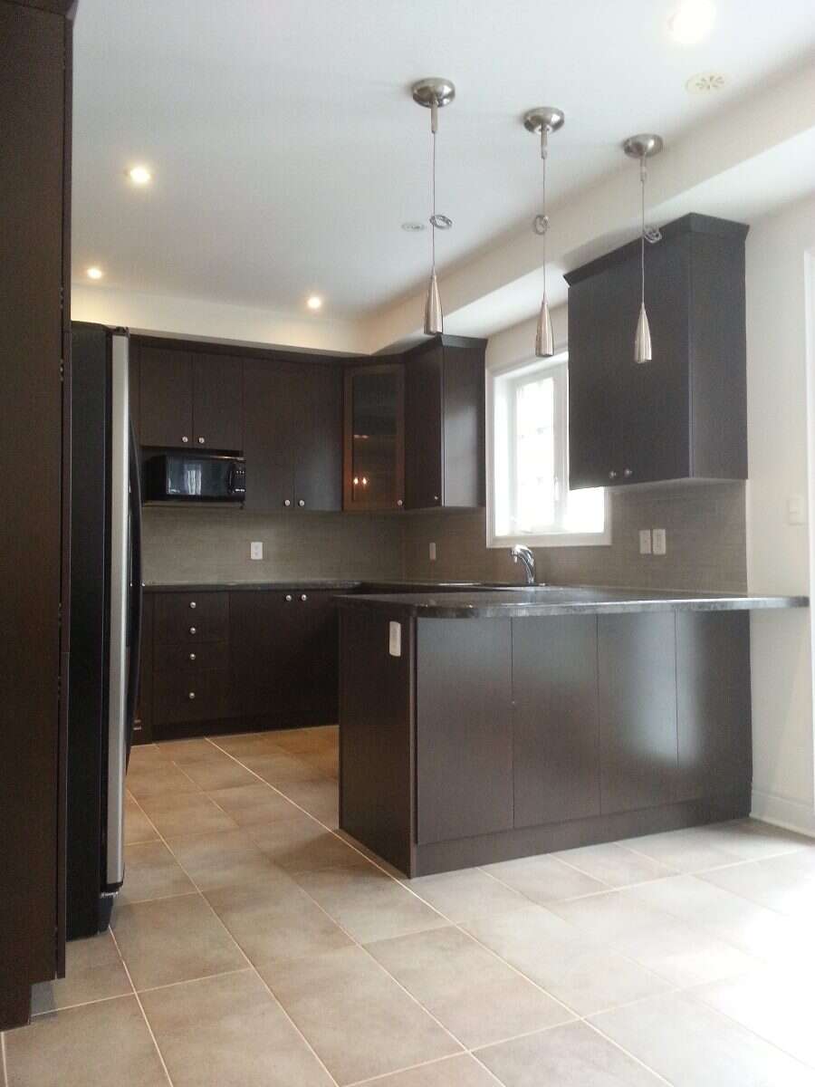 Freehold End-Unit Townhome Double-Car Garage