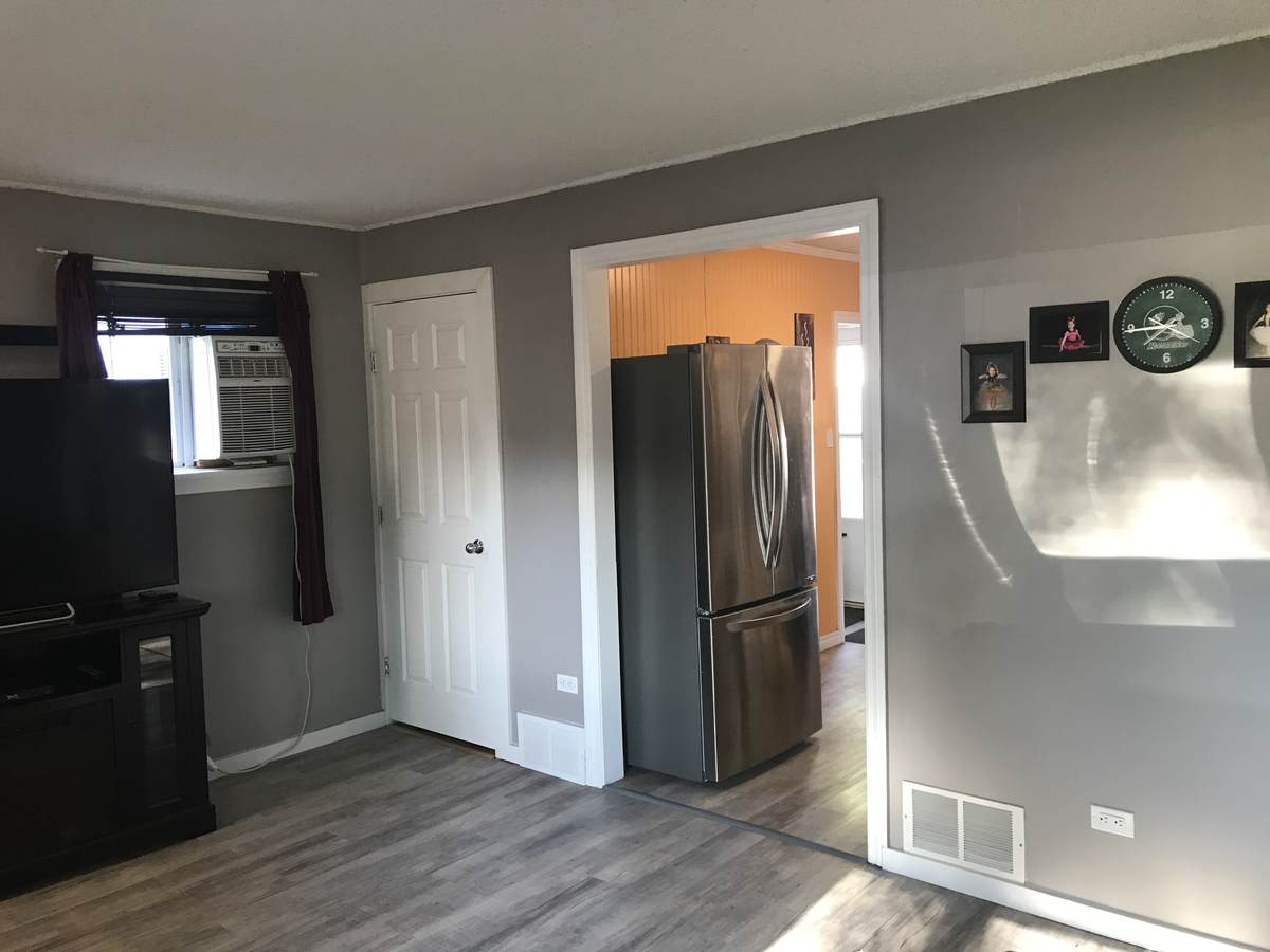 New black granite sink, back splash and a black stone Arbrite counter top.