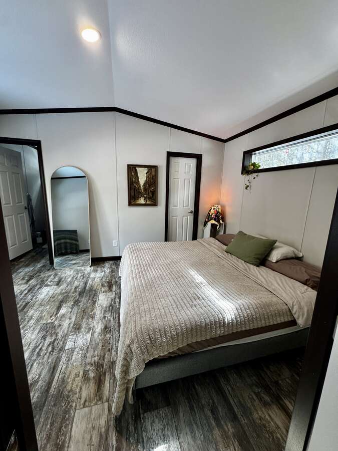 Beautiful large main bedroom with his and hers closets and ensuite bathroom