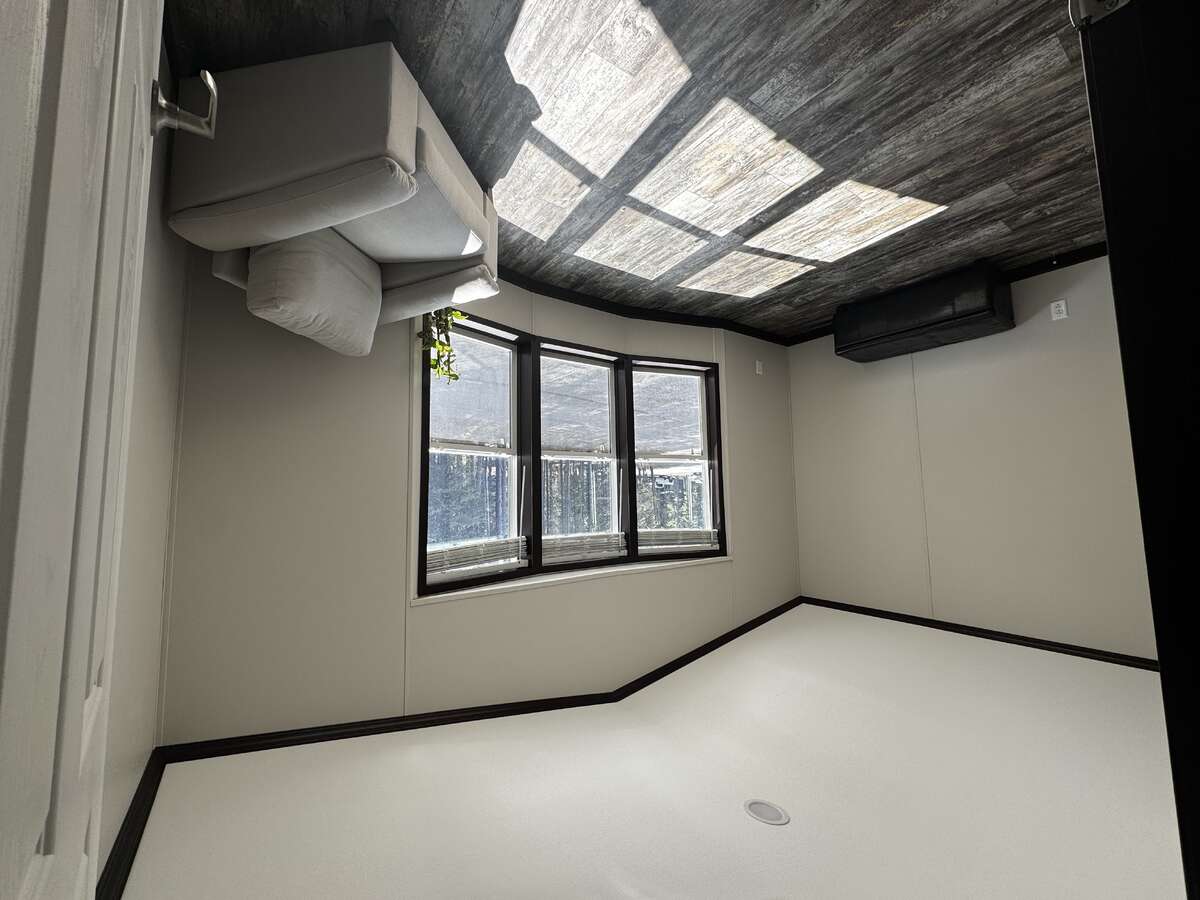 Front room with gorgeous views of Mount Kidd Mountain