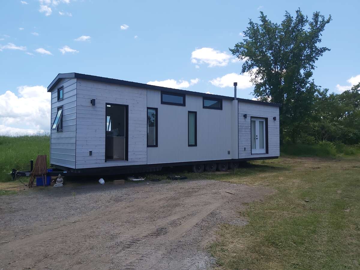 High-end, custom 40x10x10 off-grid tiny home