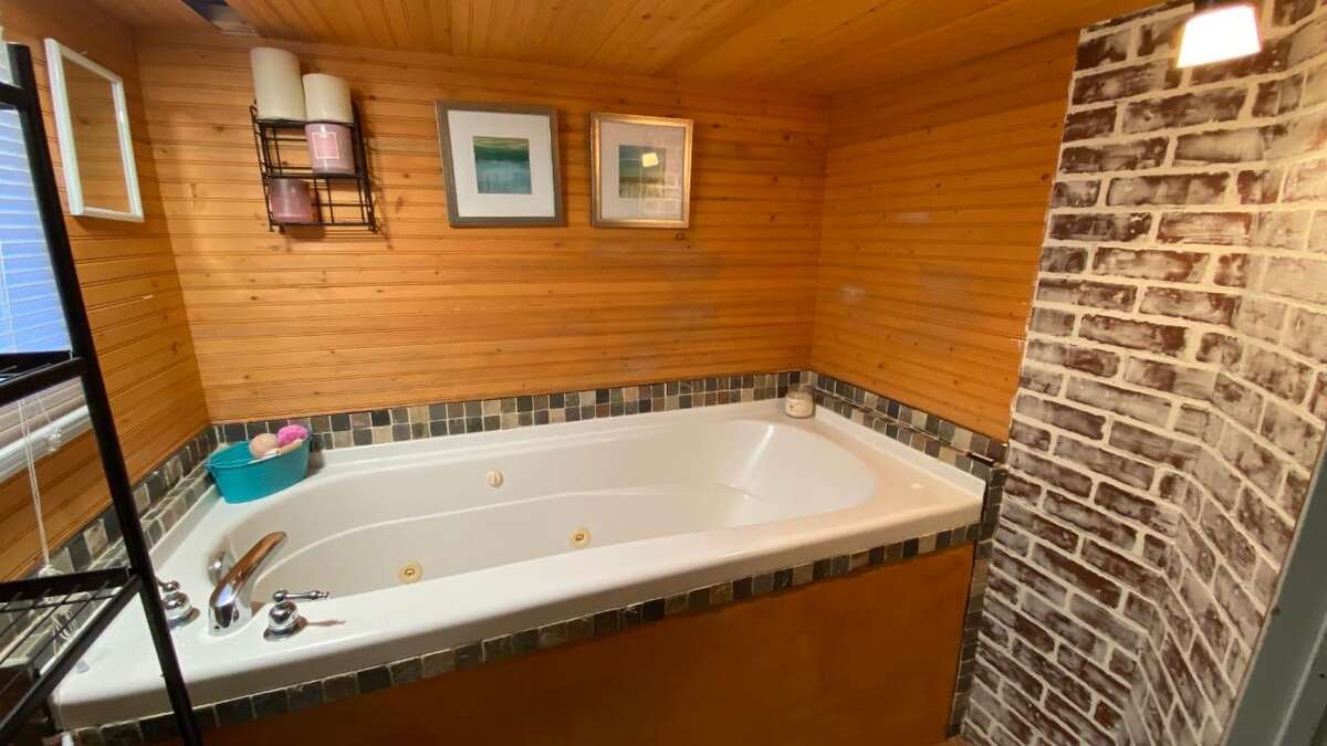 LARGE jacuzzi tub in the basement bathroom