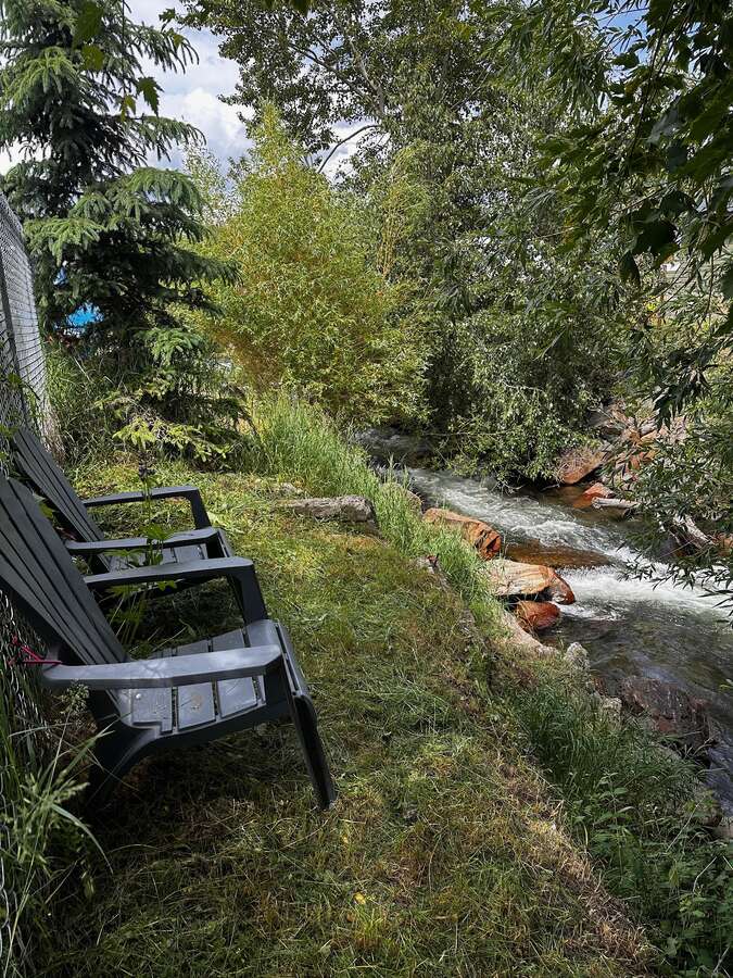 Creekside coffee spot! With a trail that leds to a swimming hole!