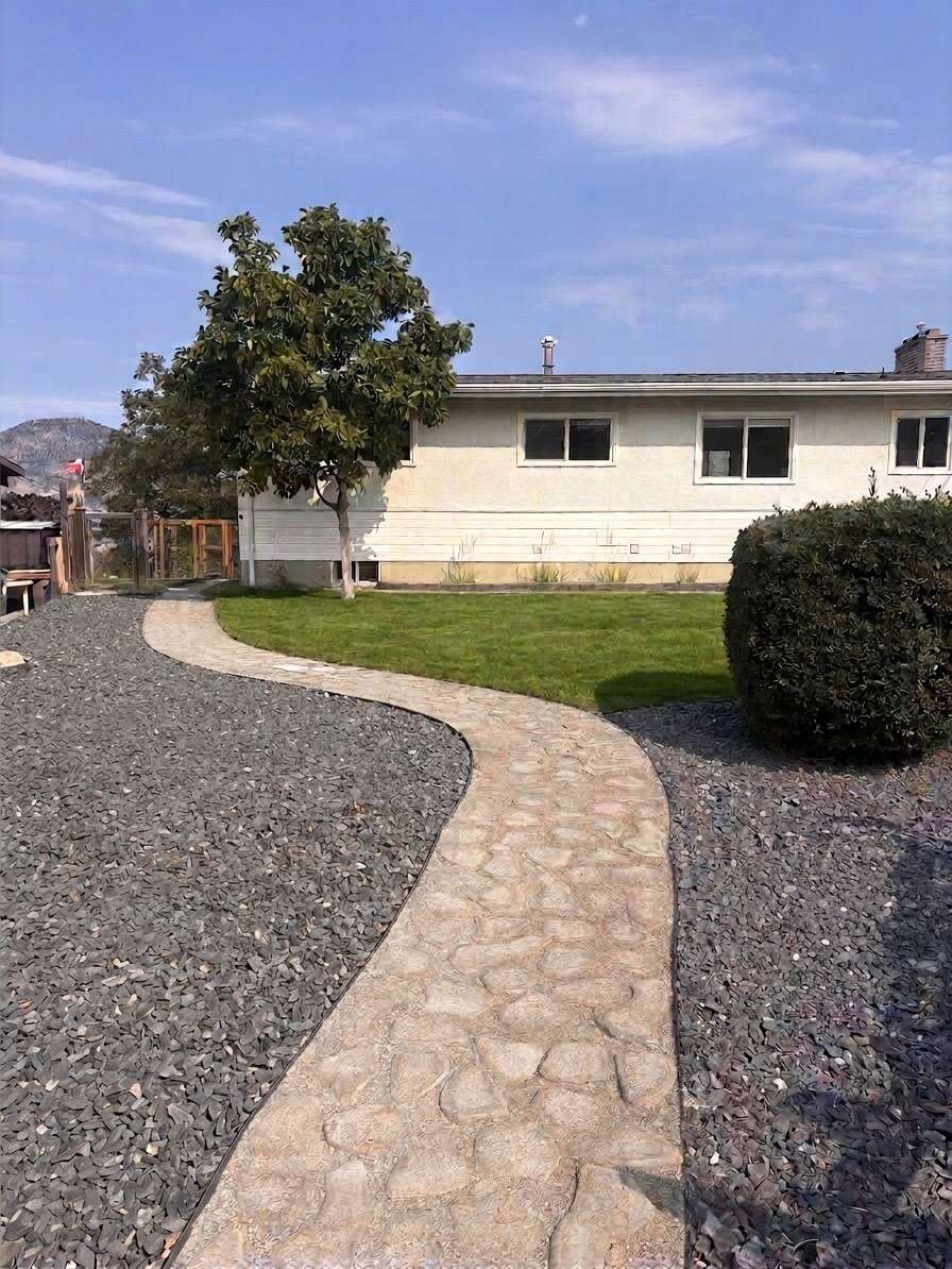 Daylight Rancher with Legal Suite & Stunning Views