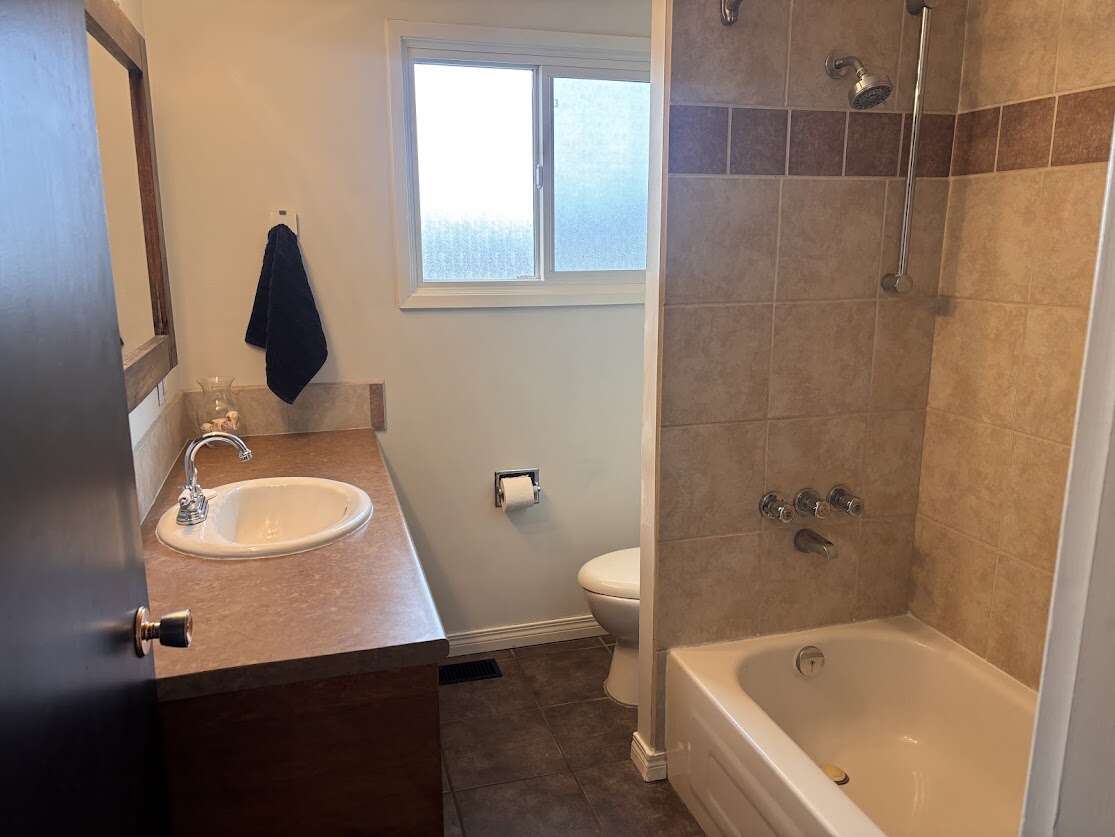 Daylight Rancher with Legal Suite & Stunning Views
