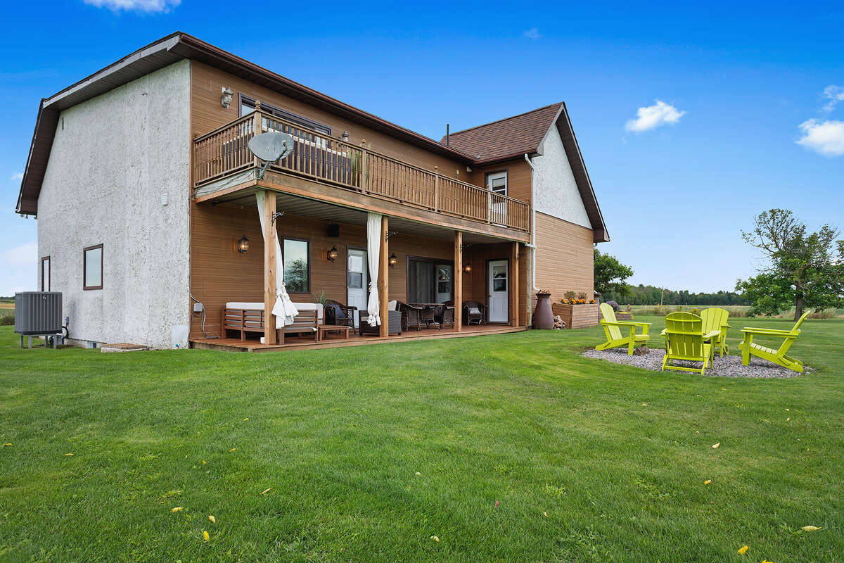 Rear Side with fire area and cozy patio