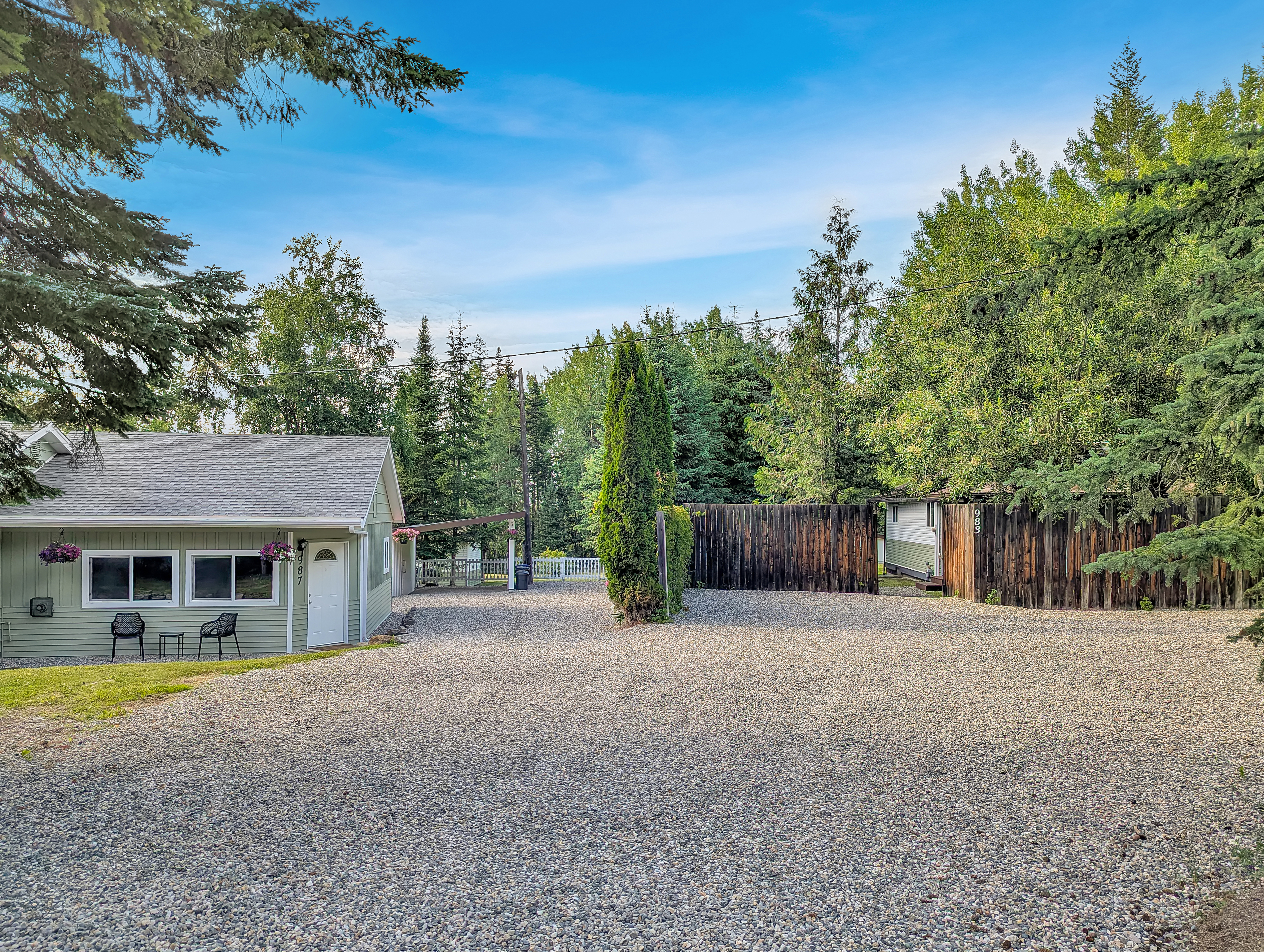 Two Detached Homes on a Private 1-Acre Property