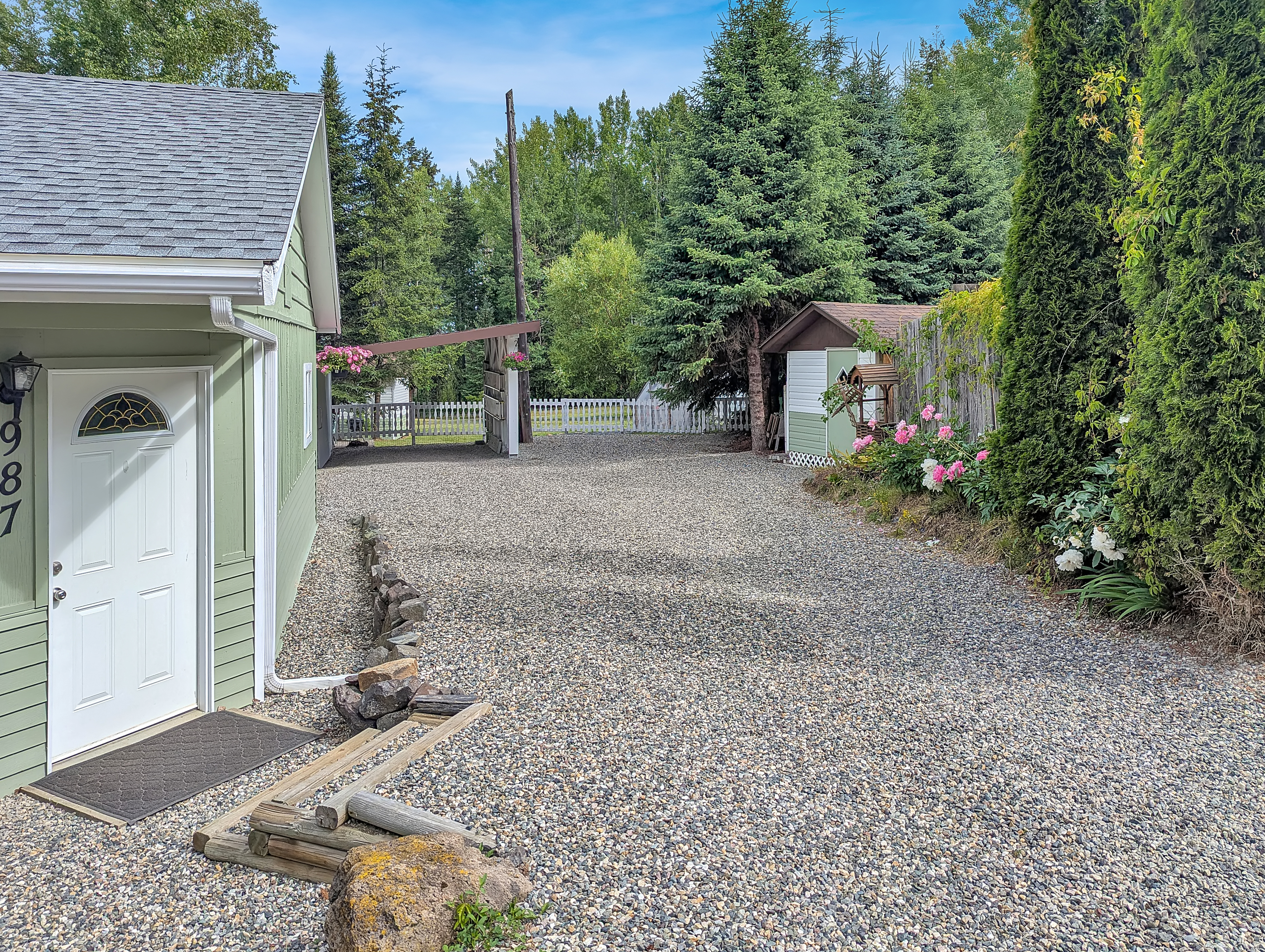Two Detached Homes on a Private 1-Acre Property
