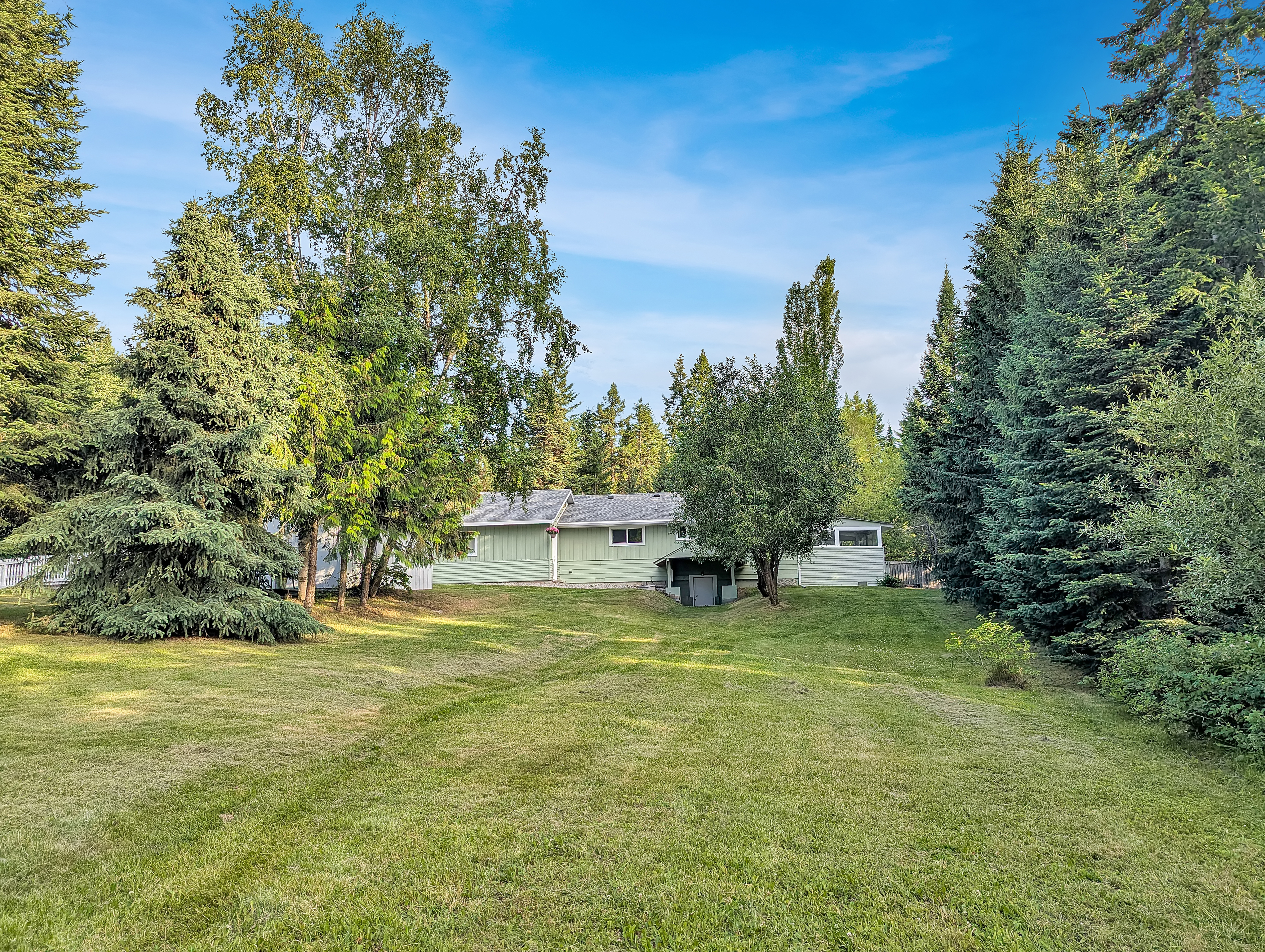 Two Detached Homes on a Private 1-Acre Property