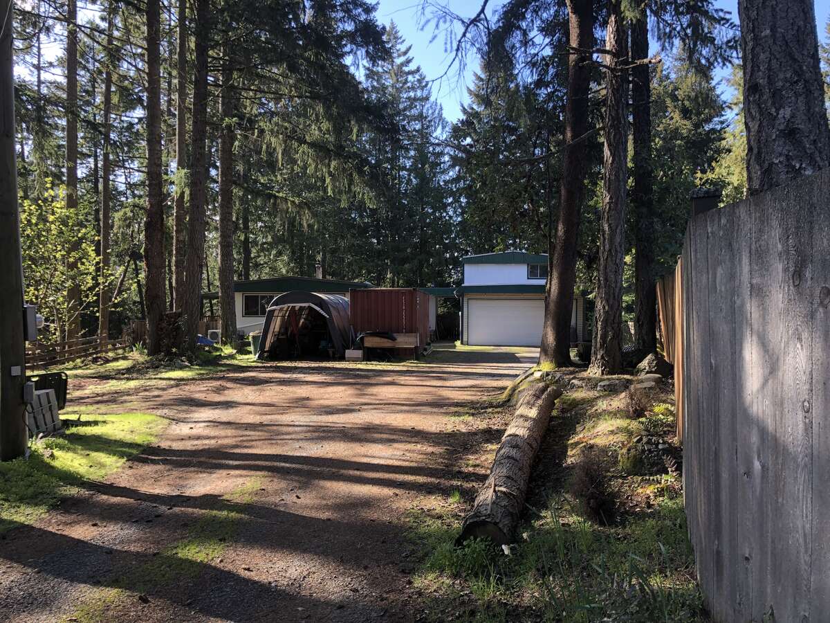 Land with Building(s) / Acreage / Home with Unregistered Suite / Mobile Home / Revenue Property For Sale in Nanaimo, BC - 2 bed, 1.5 bath