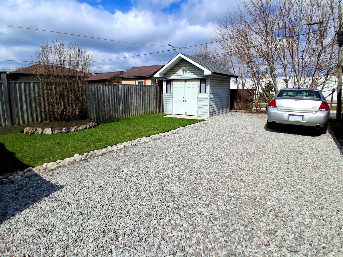 Back Yard With Driveway (Plenty Of Vehicle/Trailer Space)