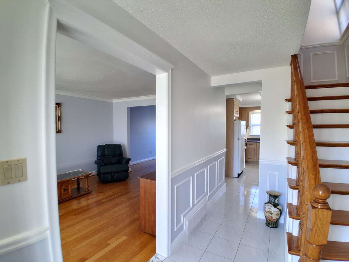Hallway Leading To Living Room And Kitchen