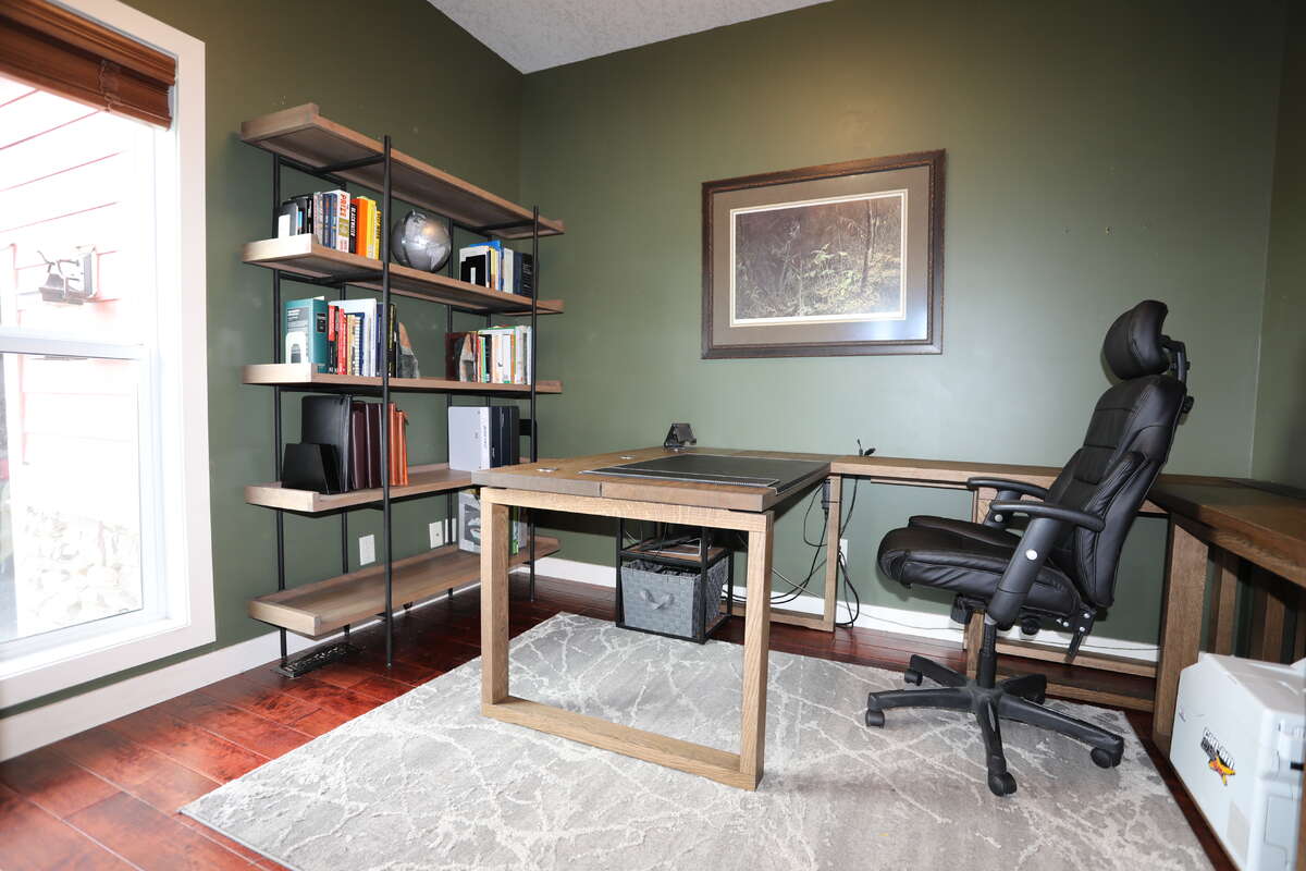Home office/den next to the front door for work or pleasure looking out East to see the sunrise
