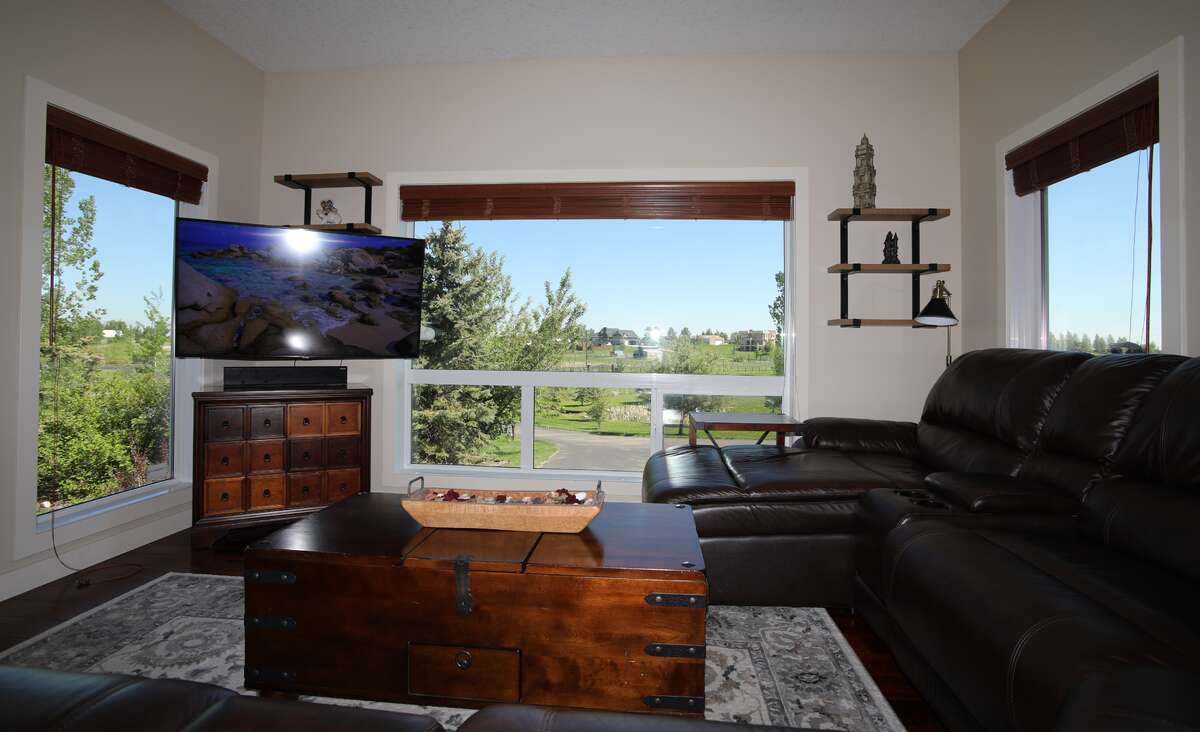 Home office/den next to the front door for work or pleasure looking out East to see the sunrise