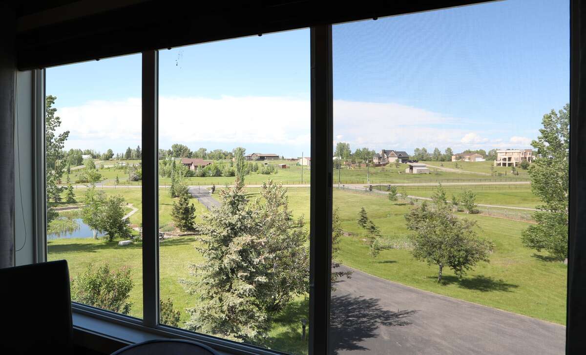 Spectacular view and peace from master bedroom, notice the pond and neighbourhood community