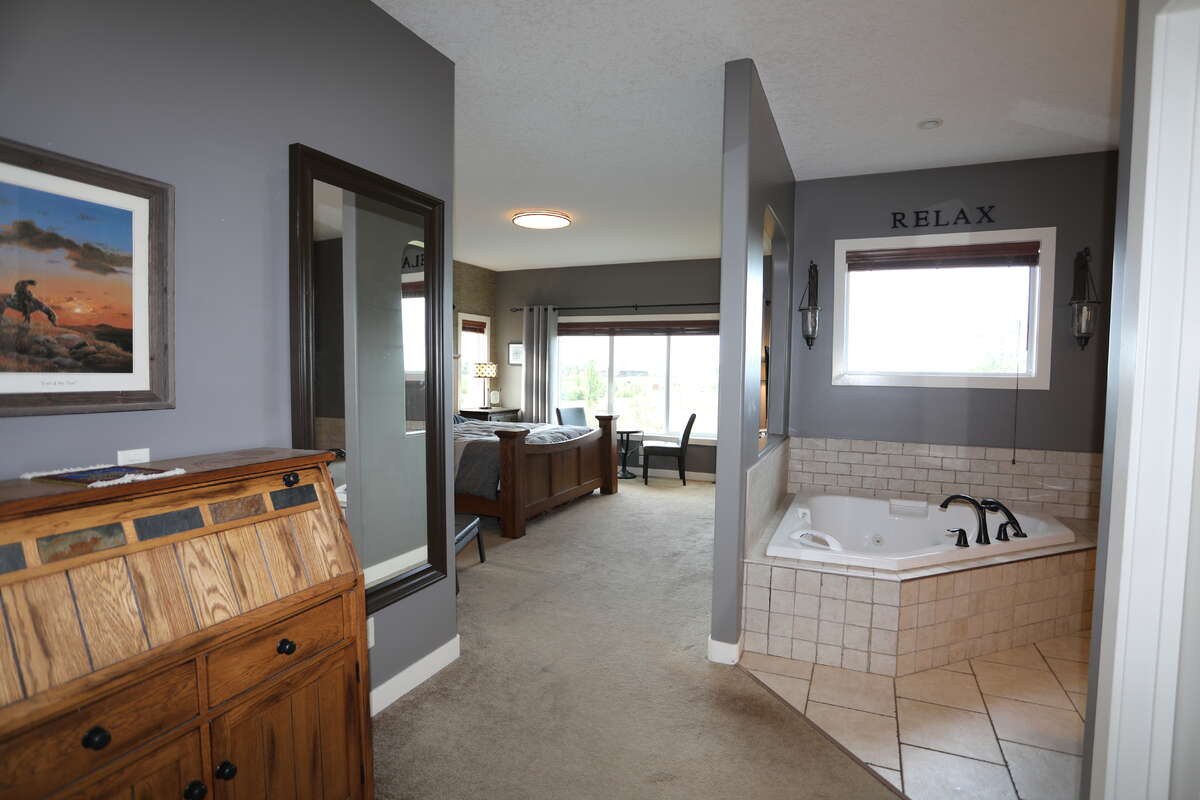 Master bedroom with an open design with a luxury hotel suite mindset
