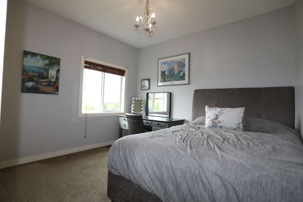 Third Bedroom on the far right with another view of sunsets