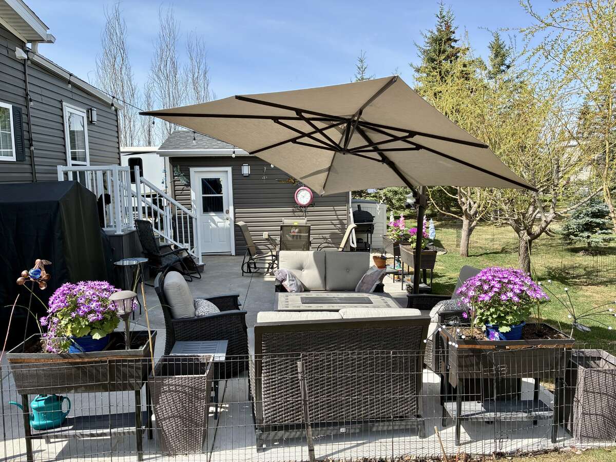 Back Yard with Slider Rockers Gliders and Fire Table