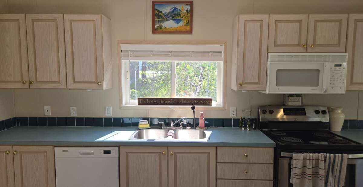 so much cupboard space, that's only 1/3rd of what's there for storage in Kitchen
