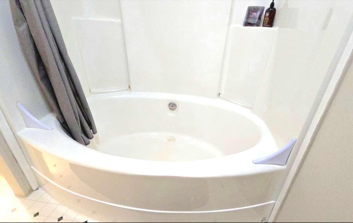 Master Bedroom ,back corner with beautiful view of yard