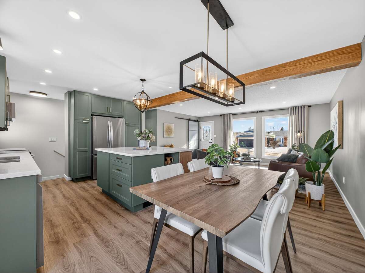 open concept with wood caped beam