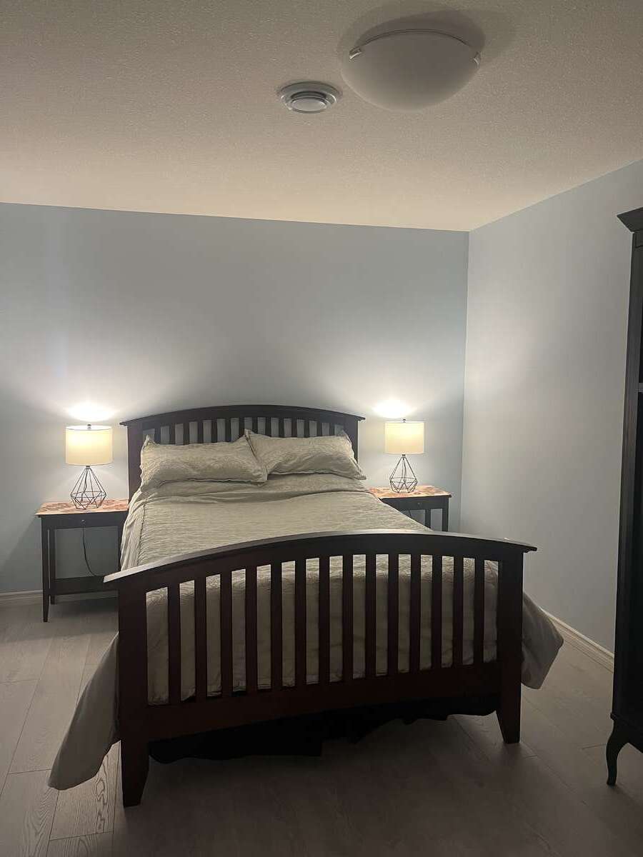 First lower level bedroom off stairs.
