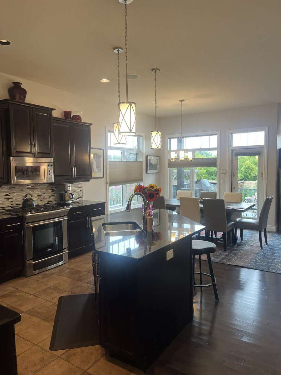 Ceramic tile in entry, kitchen, first office/bedroom  and bathrooms.
