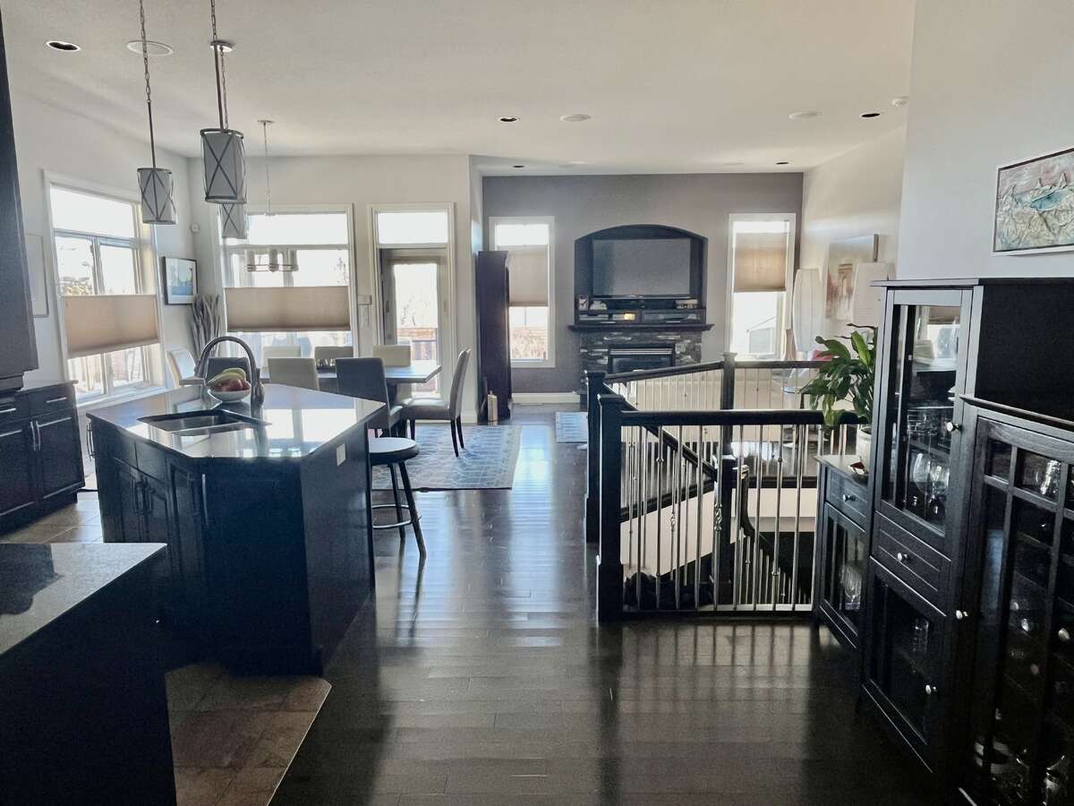 Gorgeous open concept with hardwoods throughout