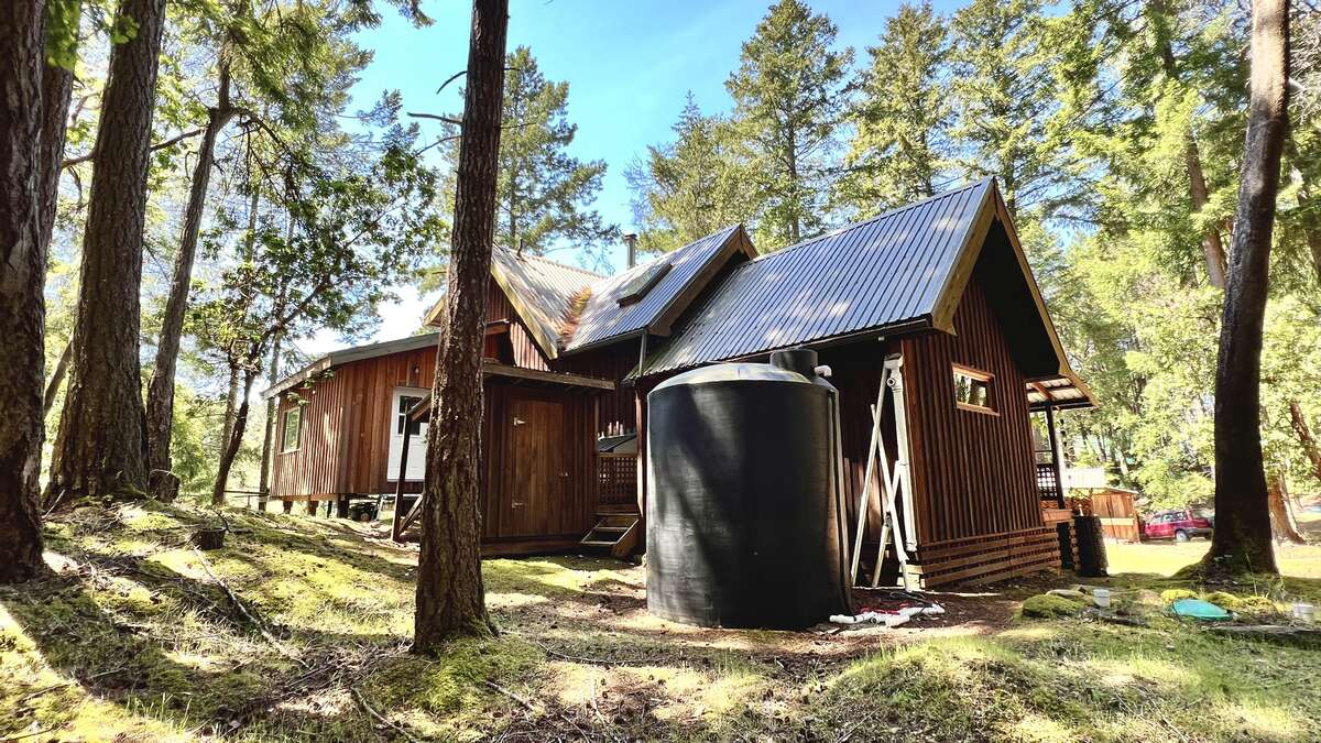 Back of house - cistern, kiln or storage shed, and addition to the left