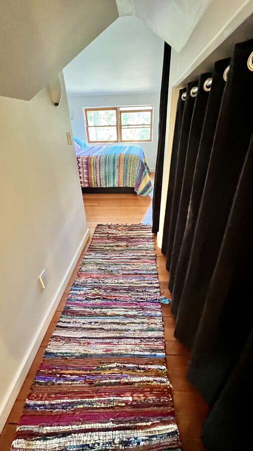 Laundry behind blue curtains