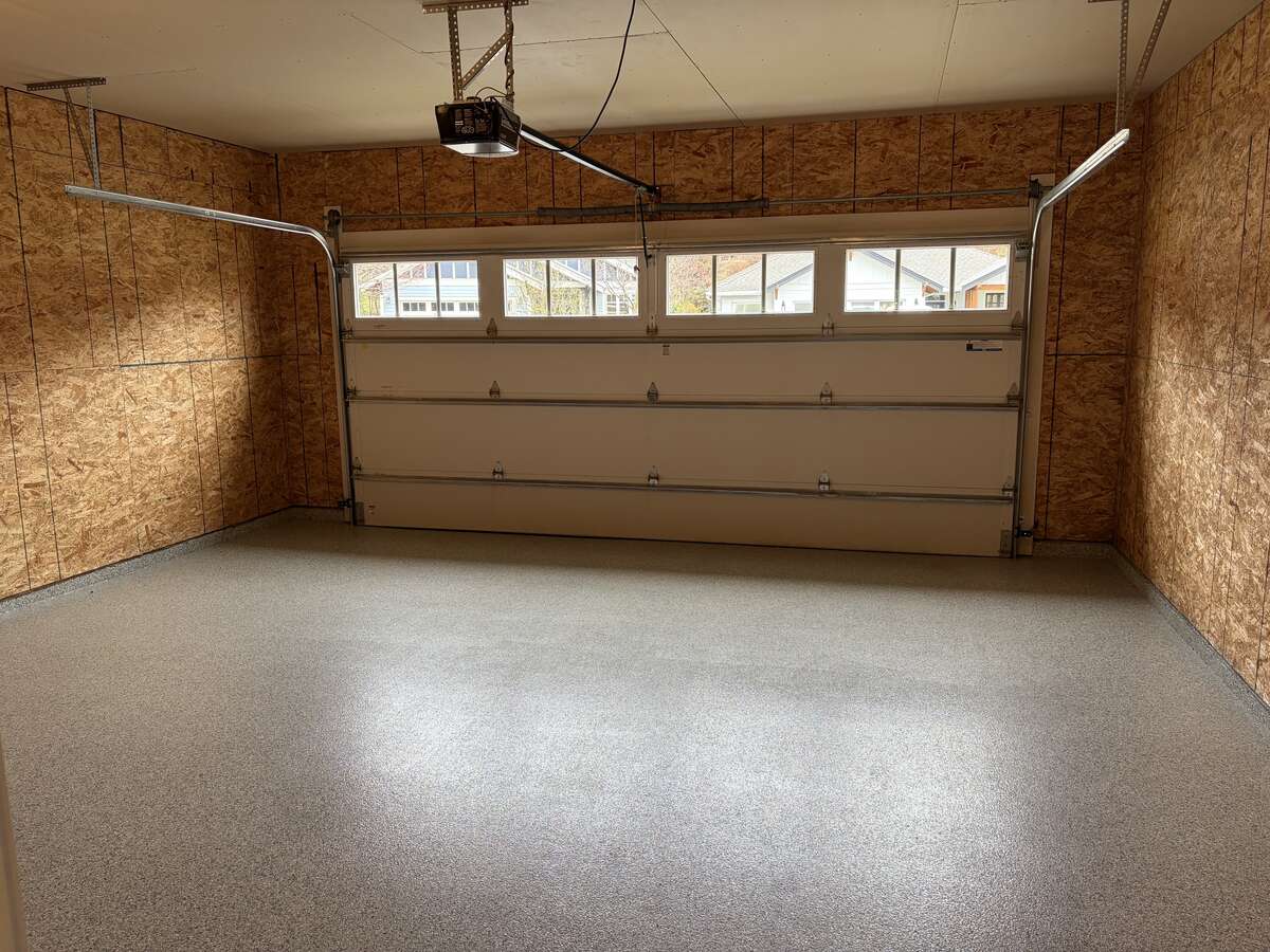 Fully insulated garage with Polyguard flooring.
