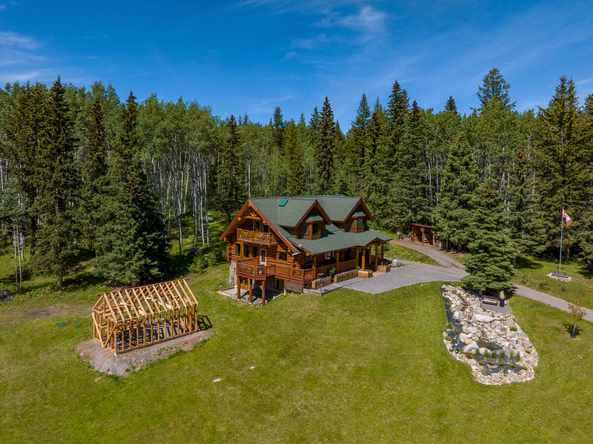 Acreage / Land with Building(s) For Sale in Bridge Lake, BC - 4 bed, 4 bath