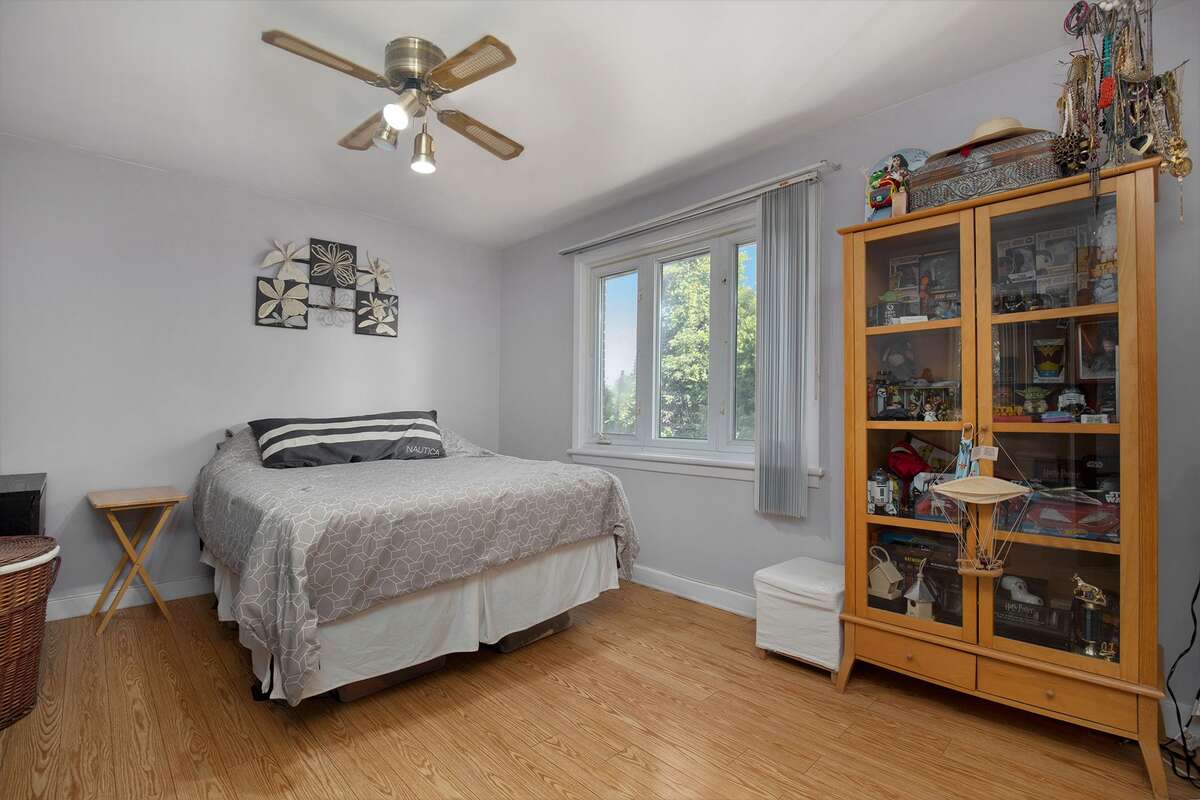 Master bedroom with ceiling fan 24' x 10'10" excluding the closet